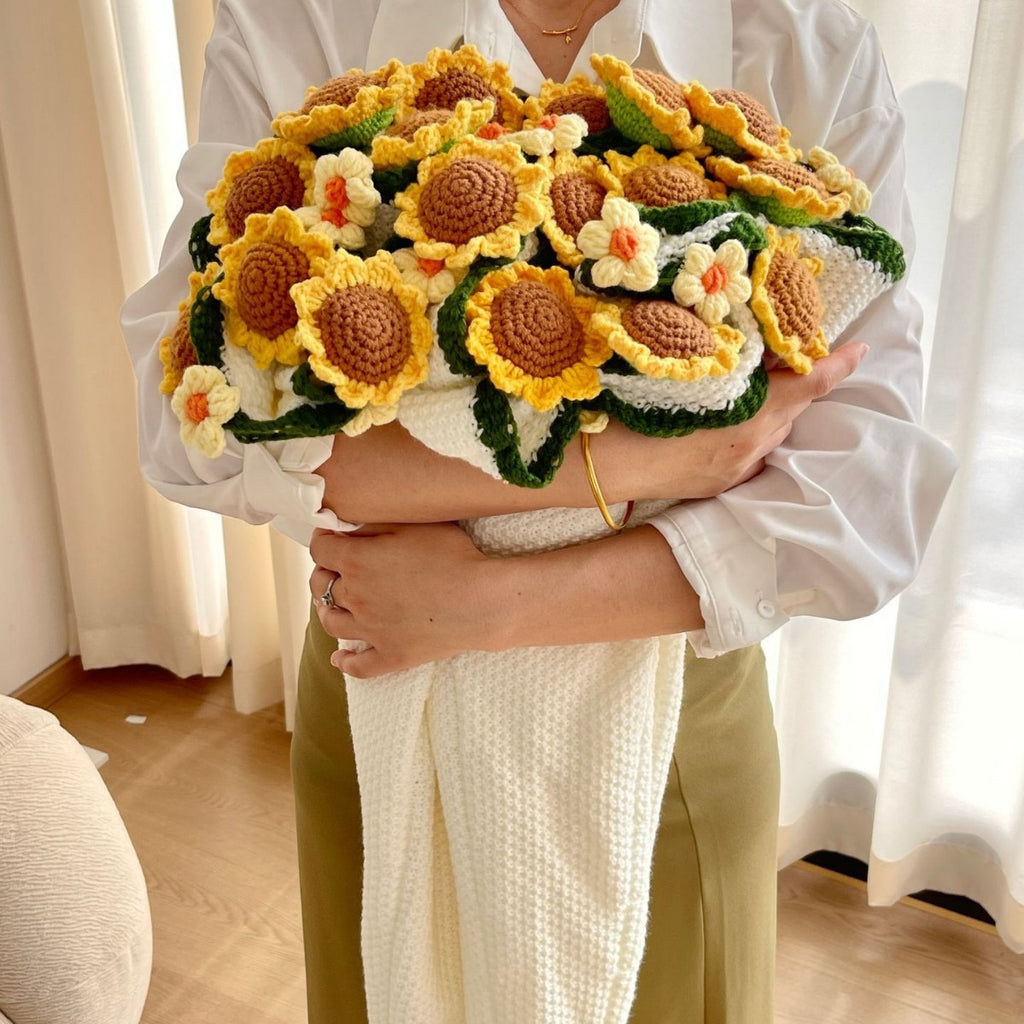 Handgefertigte Häkeldecke mit floralen 3D-Blüten